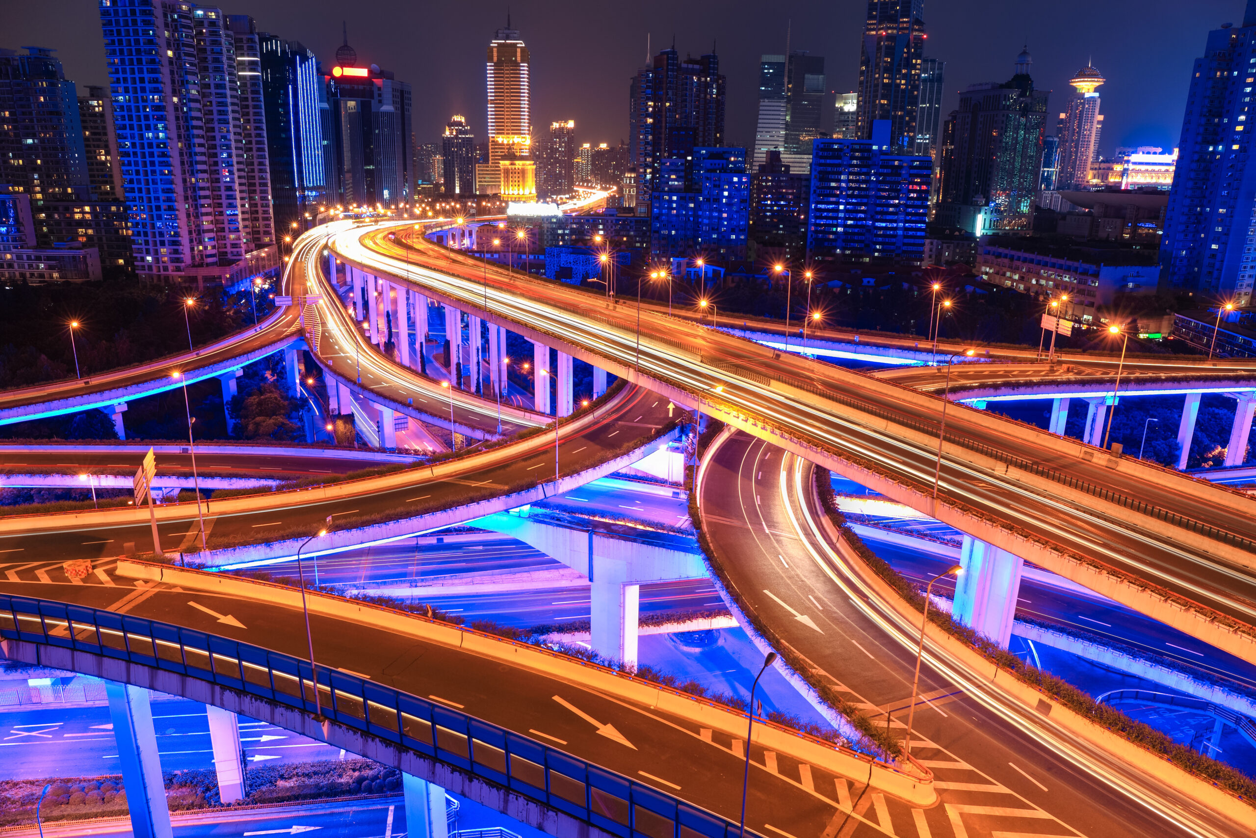 colorful city interchange overpass at night in shanghai,China